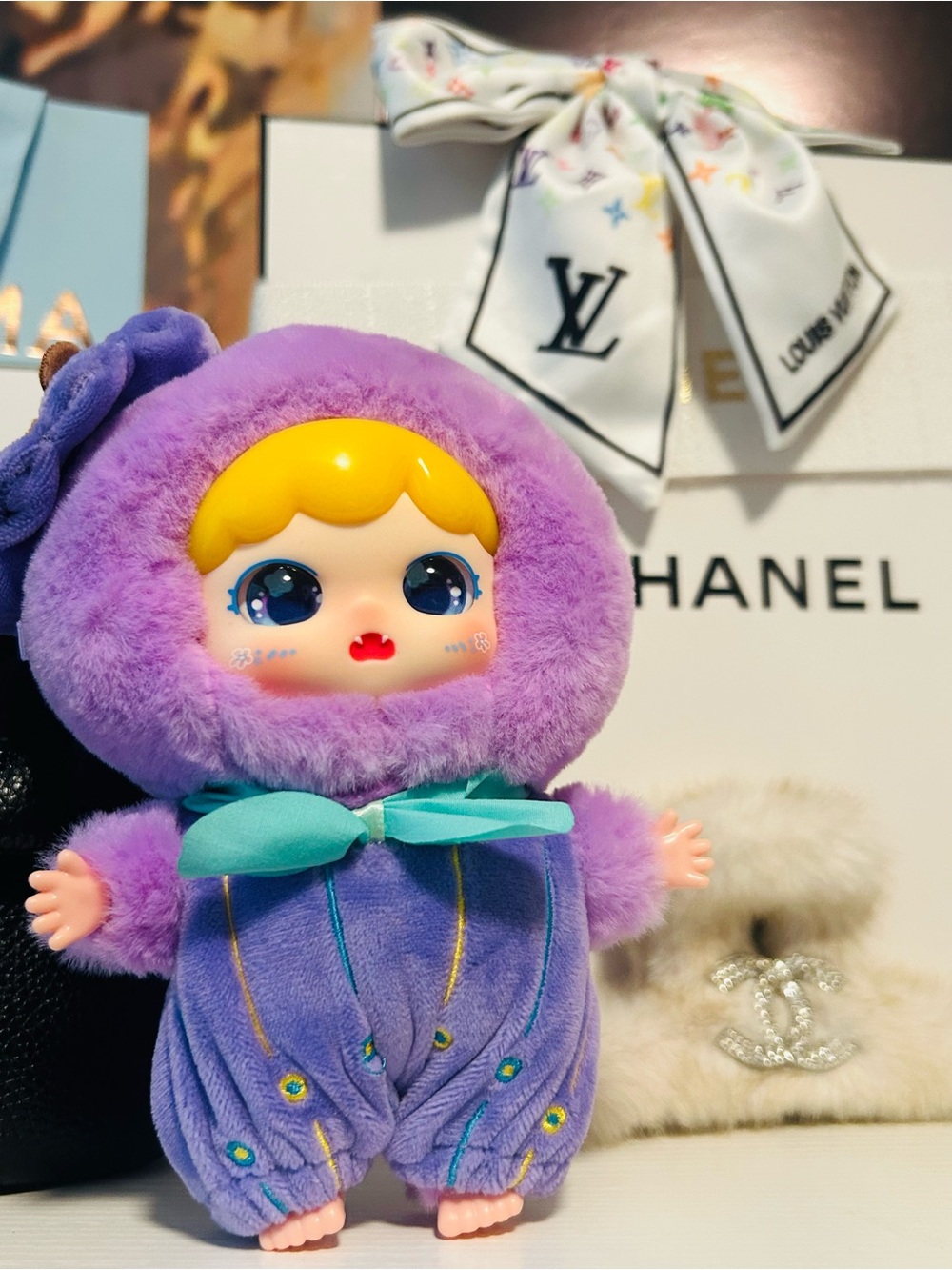 Purple Plush Doll with Teal Bow